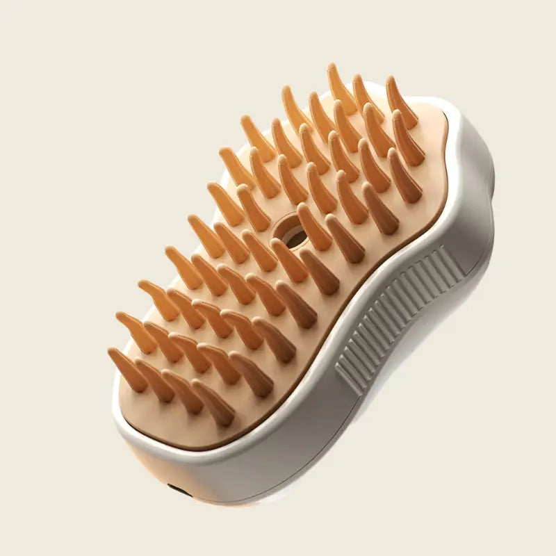 PatteVapeur grooming brush with ergonomic handle and soft bristles