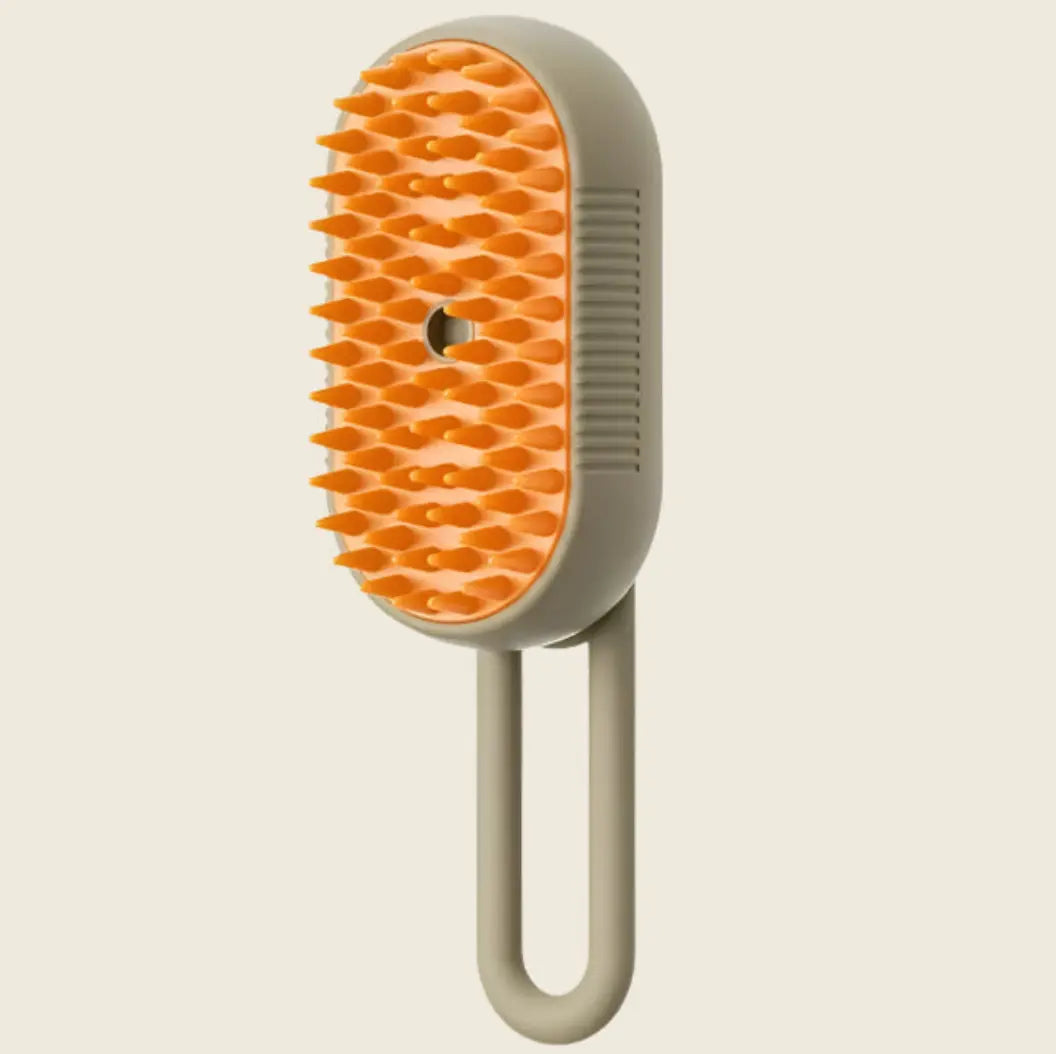 Brosse à Vapeur with orange textured surface and beige handle.