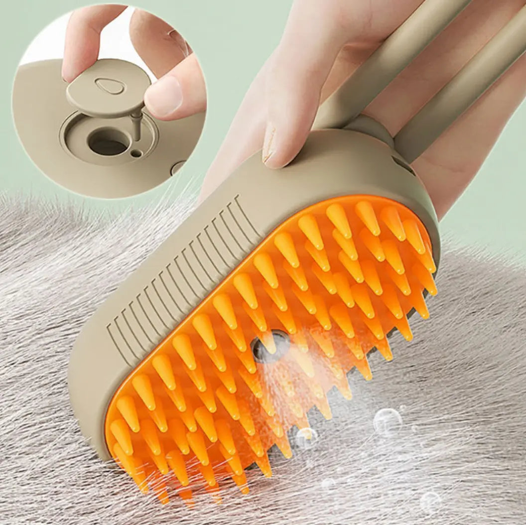 Brosse à vapeur avec picots orange et fonction de pulvérisation.
