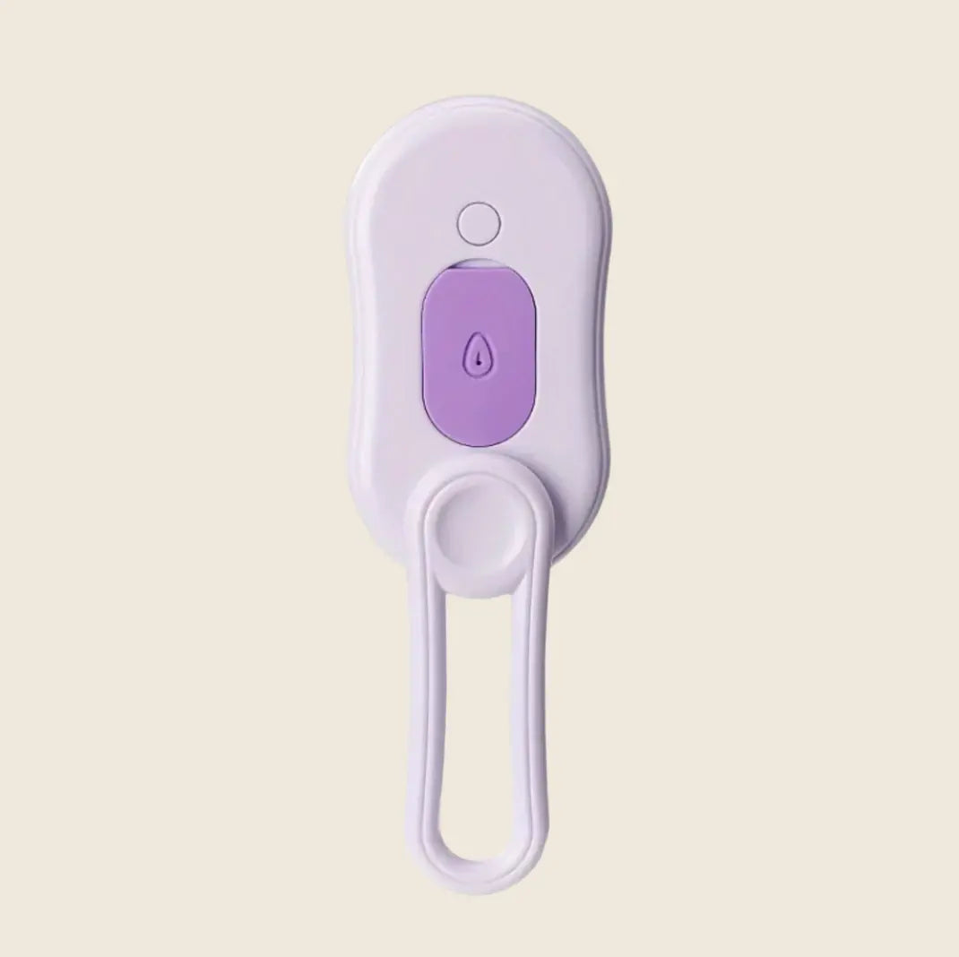 Brosse à Vapeur handheld device with purple accents.