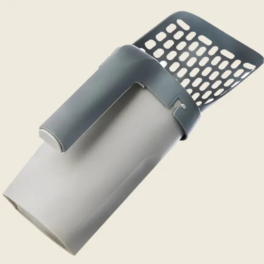 Pelle à Litière Ultime in gray with ergonomic handle.
