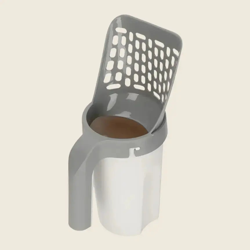 Pelle à Litière Ultime with ergonomic handle and modern design.