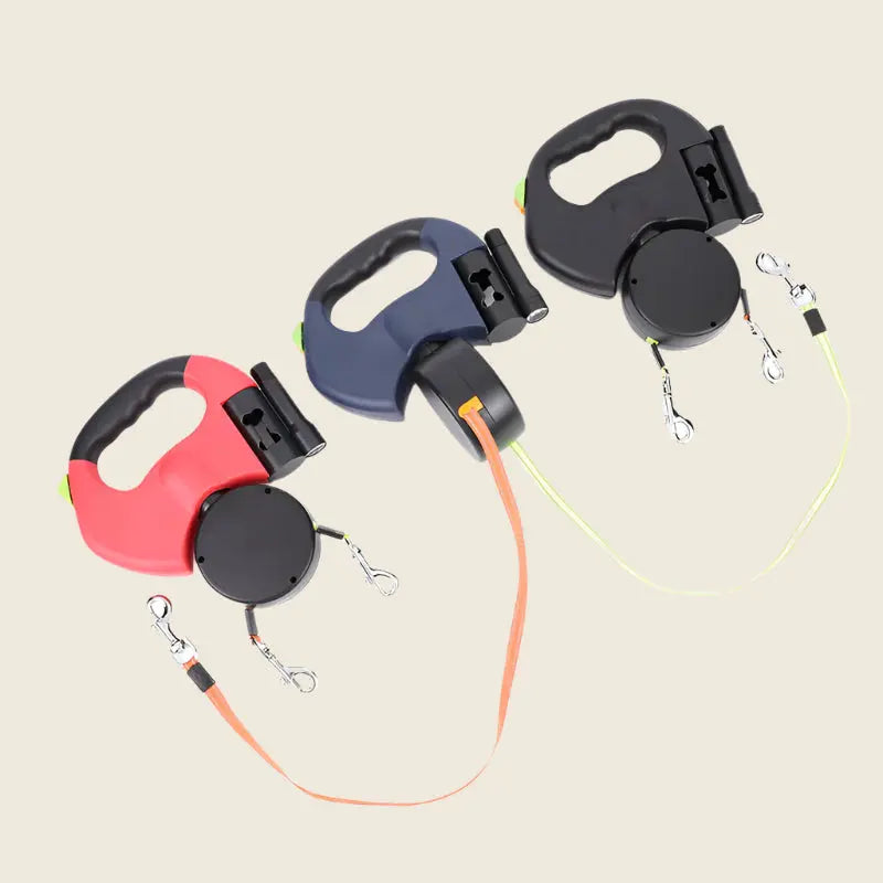 Laisse rétractable anti-enchevêtrement en trois couleurs différentes.