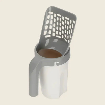Pelle à Litière Ultime with ergonomic handle and modern design.
